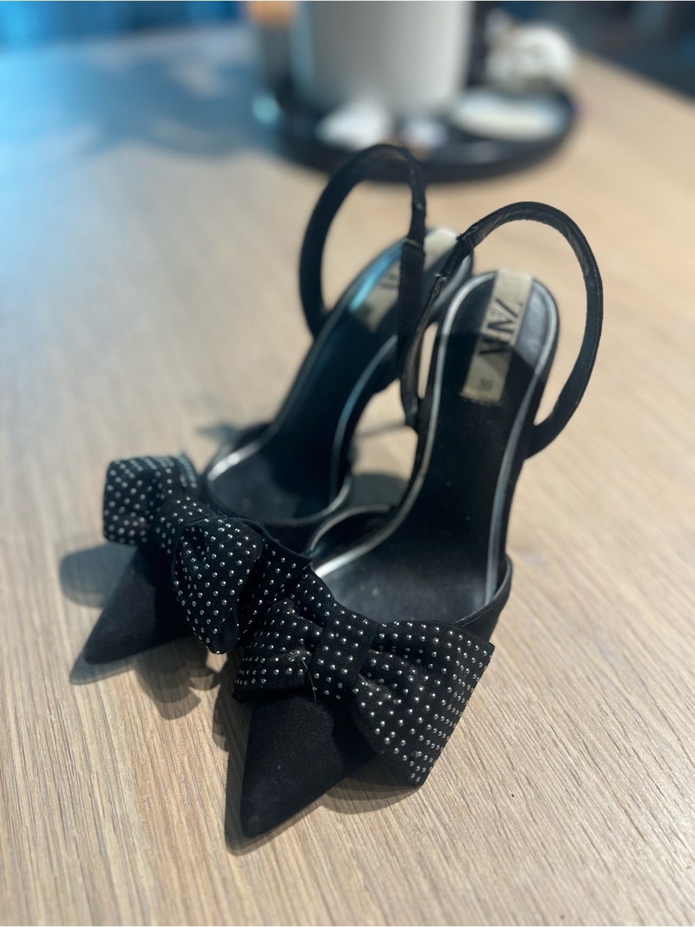 Zara Black Pointed Slingback Heels with Studded Bow Accent